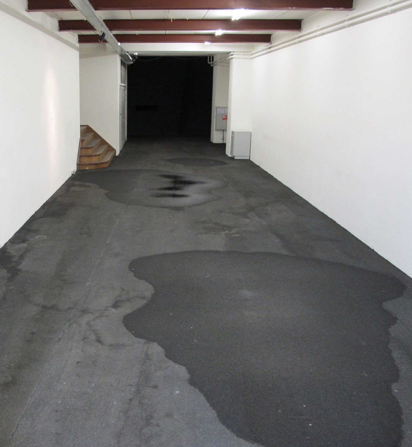 This is Not a Work, 2011. Pipes, dripping water, puddles. Installation view W139, Amsterdam.