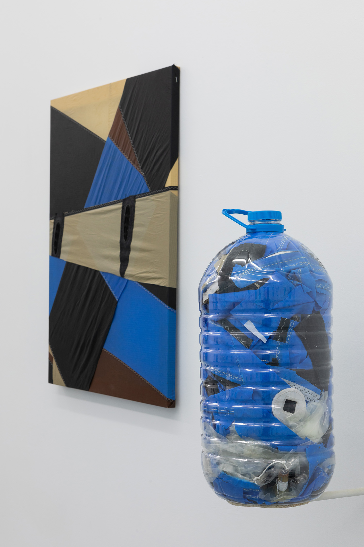 Naish Fild, 2021. Kite fabric on frame and 10 litres plastic bottle, parts from kite. 70 x 50 cm + bottle 42 x 19 cm