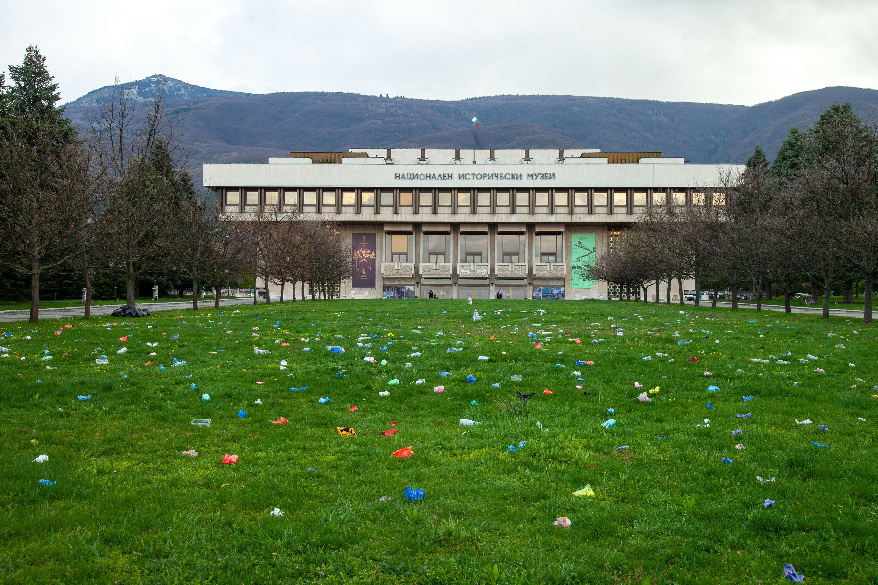 Border Flowers, 2025. Installation, plastic waste on a lawn. Installation view, National History Museum, Sofia. Photo: Boris Misirkov
